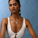 Silver Creator Pendant styled with the Creator Mismatched Earrings