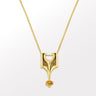 Gold necklace with The Pilgrim pendant on a white background