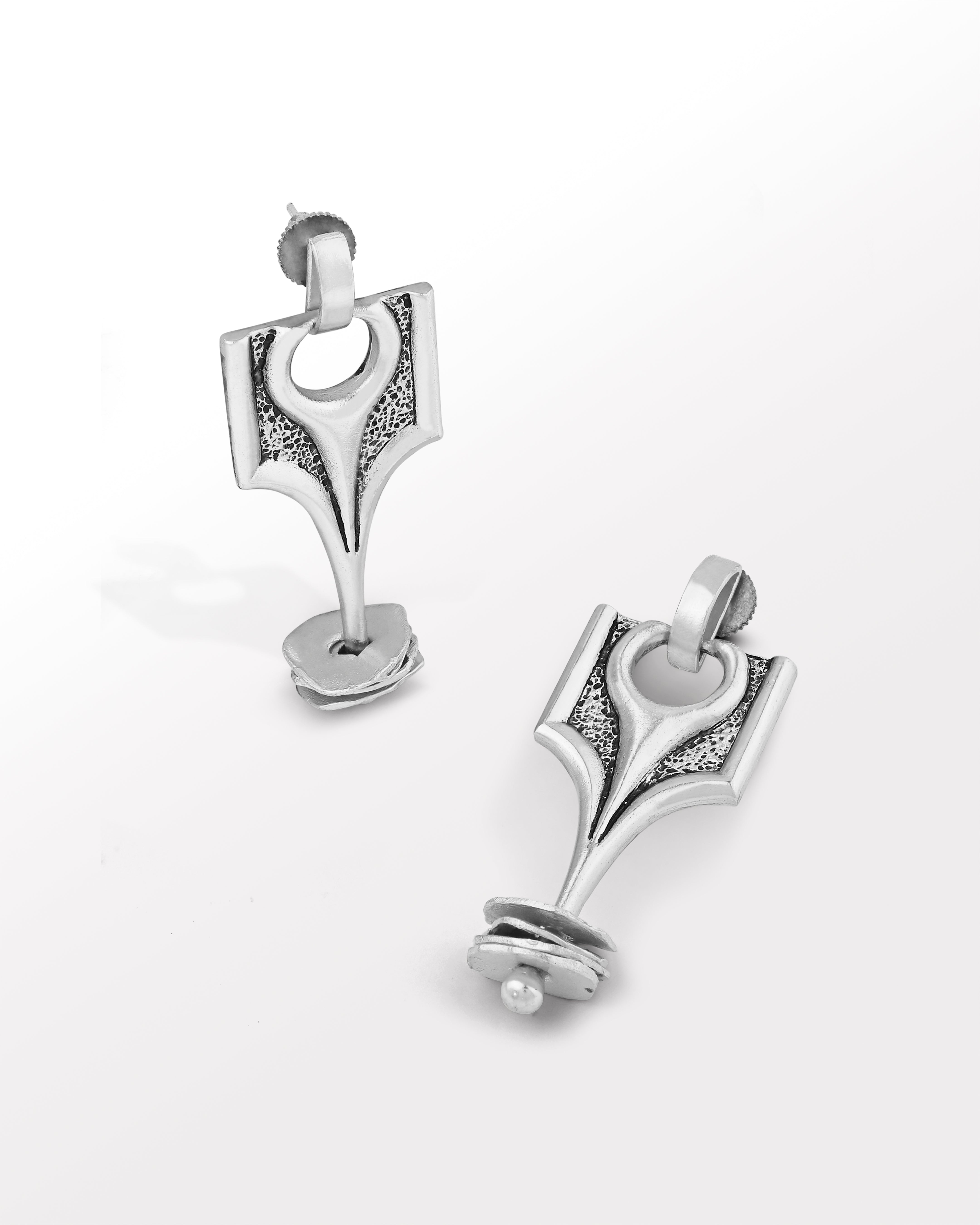 Batoki's Pilgrim Earrings in silver with textured intricate designs 
