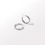 Handmade textured hoops in Silver