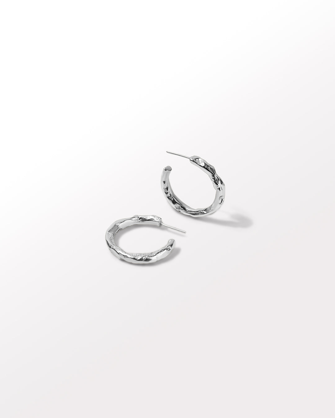 Handmade textured hoops in Silver