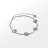 Silver choker with knot charms